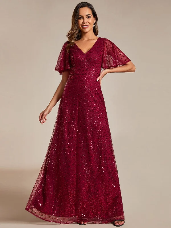 Backless Women Dress for a Sexy and Alluring Look at Evening EventsShimmering All Over Sequin Short Sleeves A-Line Formal Evening Dress